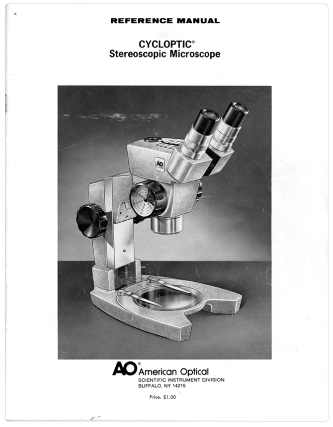 A close-up of a microscope
Description automatically generated