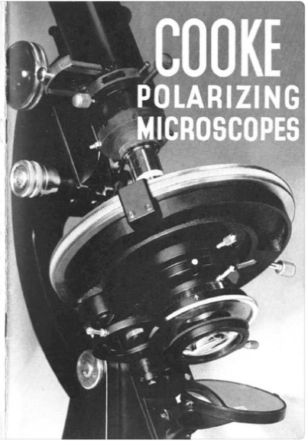 Close-up of a microscope
Description automatically generated