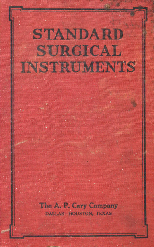 A red book with black text
Description automatically generated