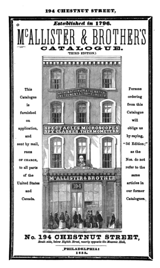 A black and white photo of a building
Description automatically generated