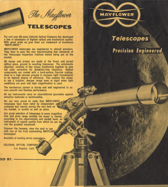 A telescope on a tripod
Description automatically generated