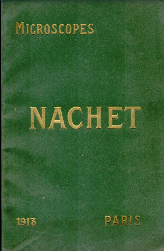 A green book with gold letters
Description automatically generated