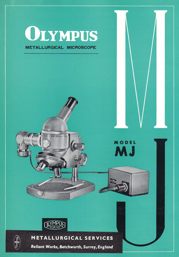 A blue and white cover with a microscope
Description automatically generated