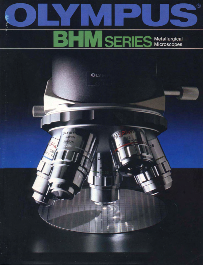 A close-up of a microscope
Description automatically generated