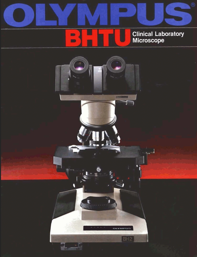 A close-up of a microscope
Description automatically generated