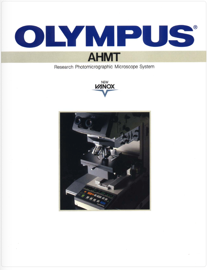 A close-up of a microscope
Description automatically generated