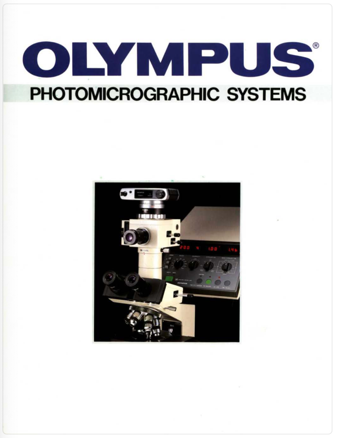 A close-up of a microscope
Description automatically generated