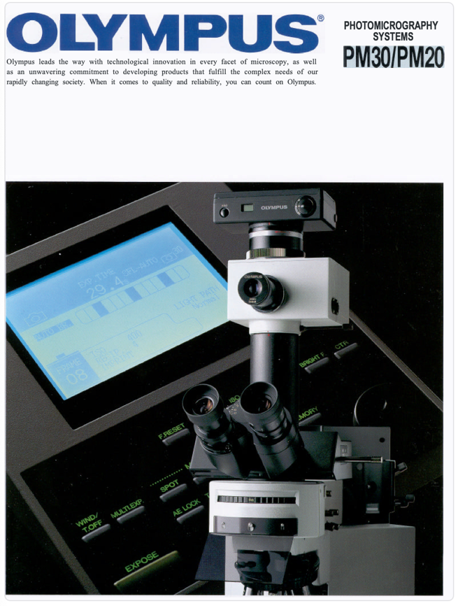 A microscope with a screen and a monitor
Description automatically generated