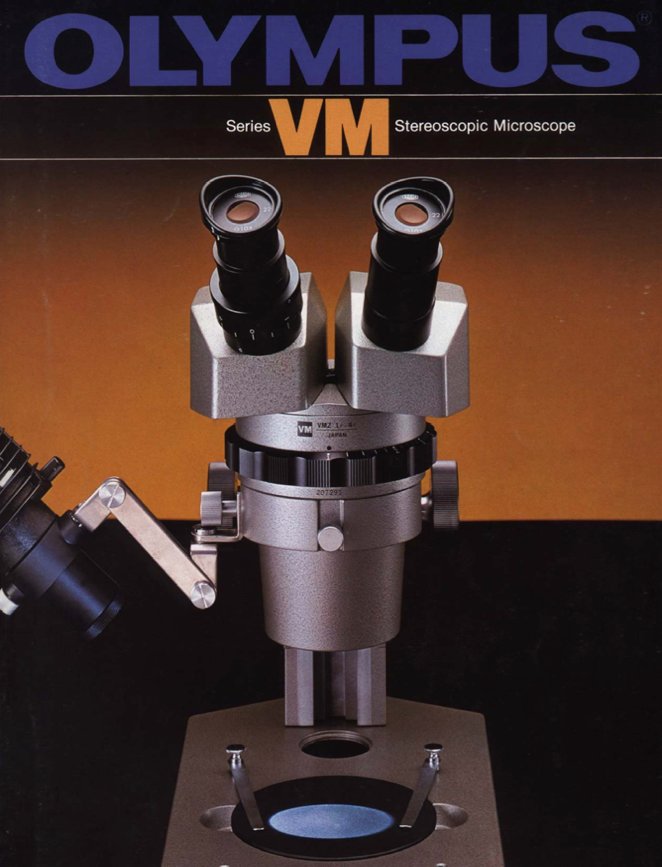 A close-up of a microscope
Description automatically generated