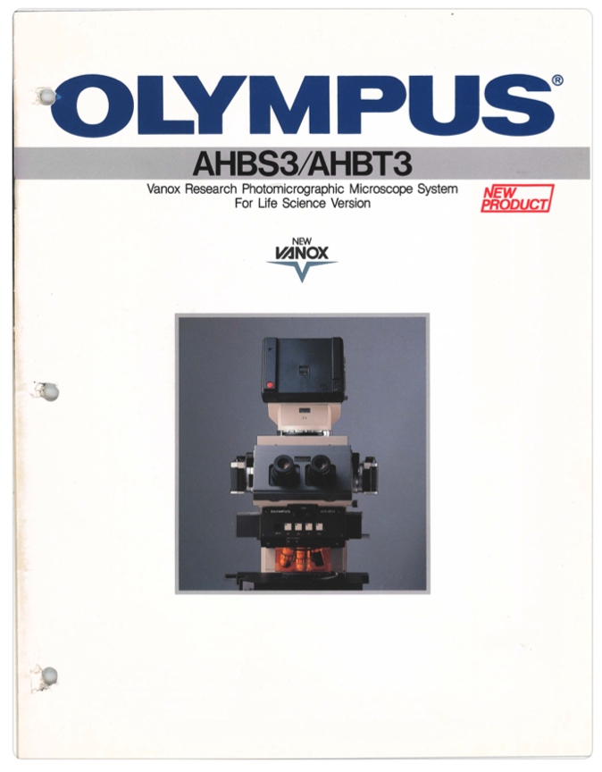 A white cover with a black and white object
Description automatically generated