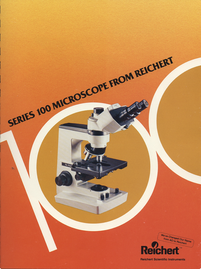 A book with a microscope
Description automatically generated