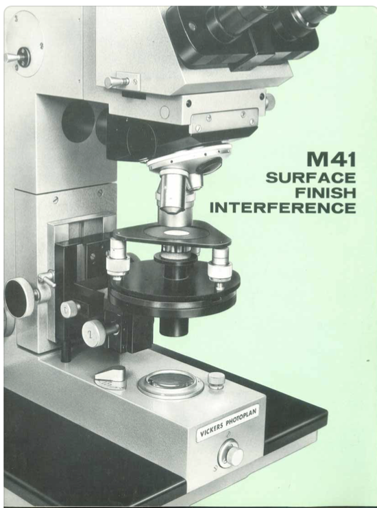 A close-up of a microscope
Description automatically generated