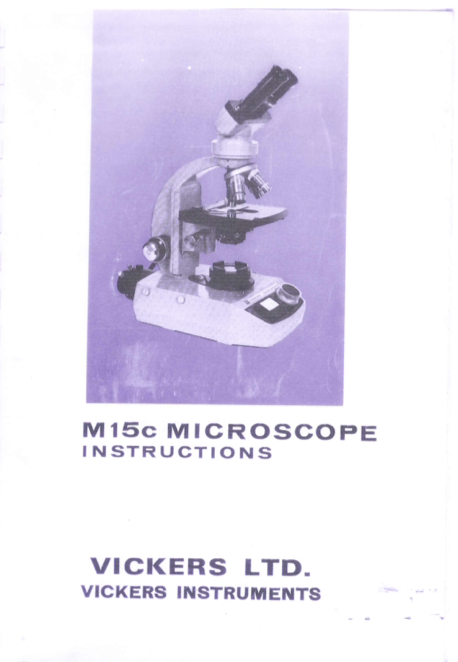 A close-up of a microscope
Description automatically generated