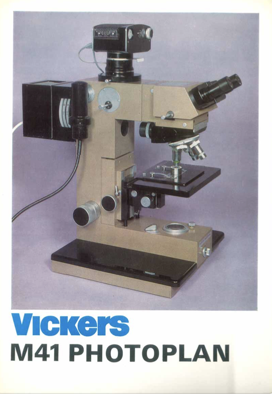 A close-up of a microscope
Description automatically generated