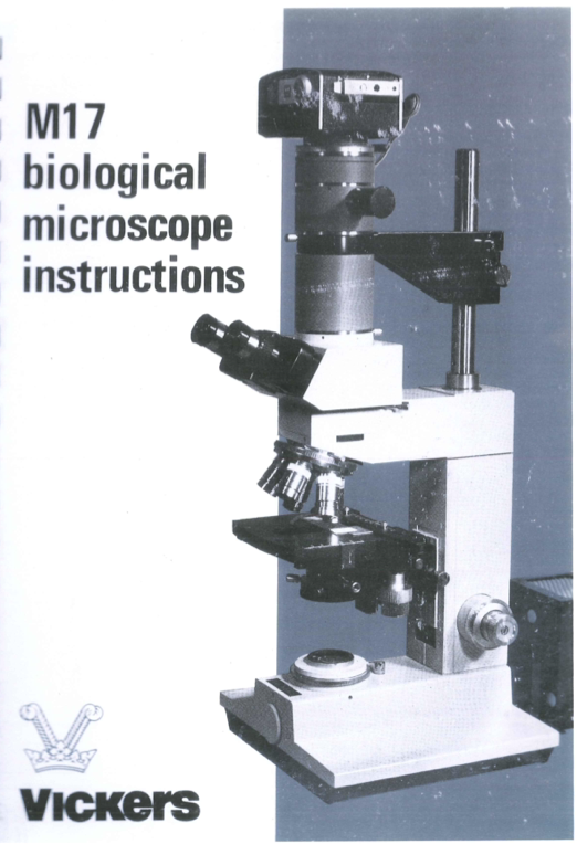 A close-up of a microscope
Description automatically generated