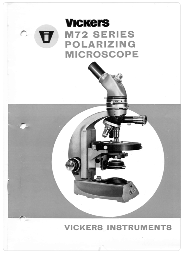 A close-up of a microscope
Description automatically generated