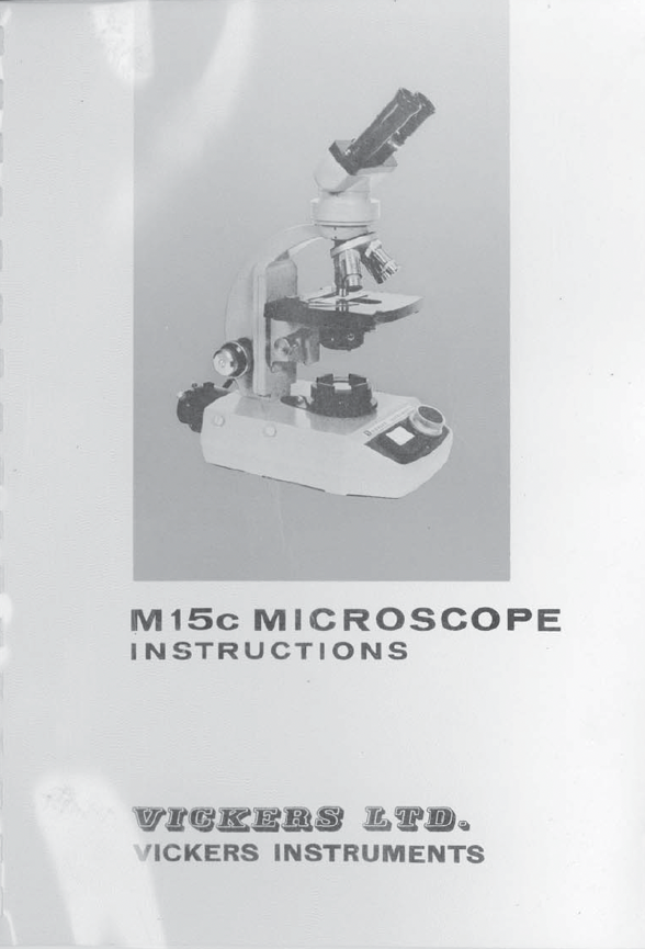 A close-up of a microscope
Description automatically generated