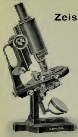 A picture containing indoor, microscope
Description automatically generated