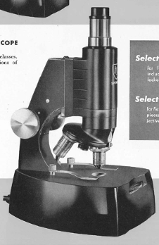 Close-up of a microscope
Description automatically generated