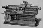 A vintage photo of a machine
Description automatically generated