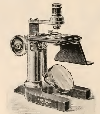 A picture containing clock, sitting, table, metal
Description automatically generated