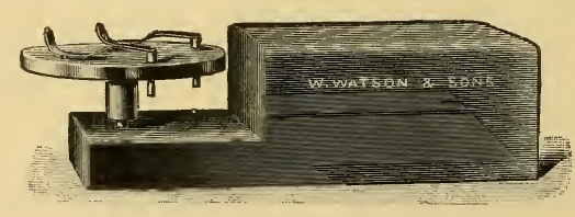 A picture containing old, sitting, monitor, table
Description automatically generated