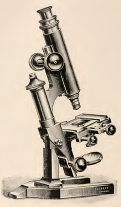 A picture containing object, indoor, microscope, table
Description automatically generated