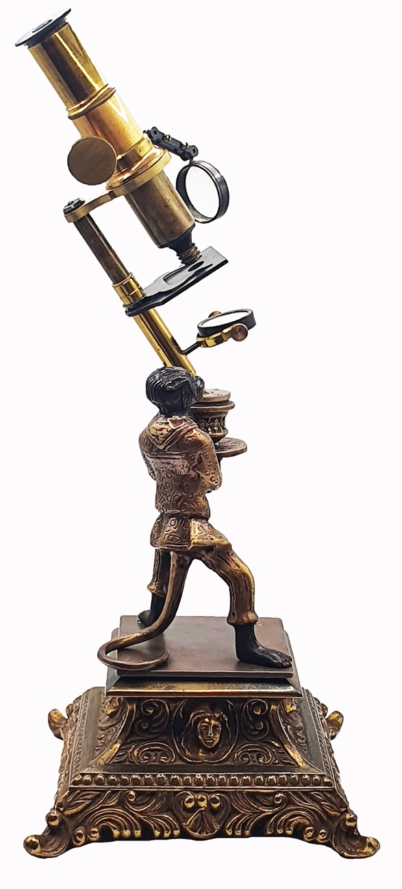 Microscope Statue A statue of a person holding a microscopeDescription automatically ...