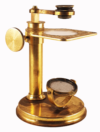 A close-up of a microscope
Description automatically generated