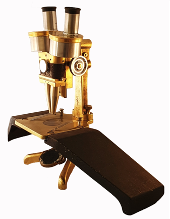 A close-up of a microscope
Description automatically generated