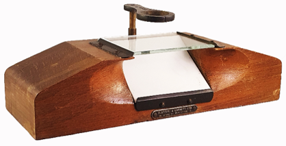 A picture containing table, wooden, indoor, stationary
Description automatically generated