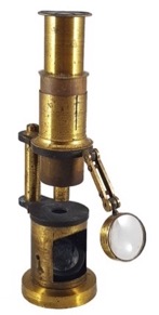 A picture containing indoor, table, sitting, black
Description automatically generated