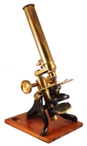 A picture containing table, sitting, small, wooden
Description automatically generated