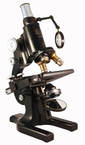 A picture containing object, motorcycle, sitting, street
Description automatically generated