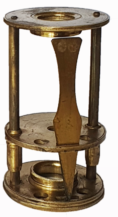 A close-up of a gold microscope
Description automatically generated