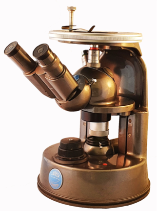 A close up of a microscope
Description automatically generated