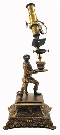 A statue of a person holding a microscope
Description automatically generated