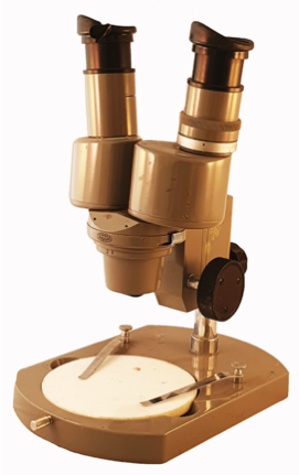 A close-up of a microscope
Description automatically generated