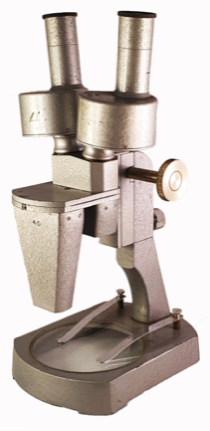 A close-up of a microscope
Description automatically generated