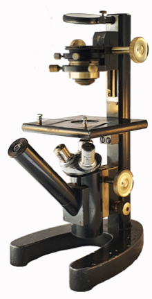 A close-up of a microscope
Description automatically generated