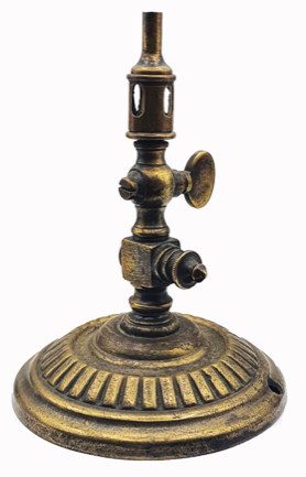 A brass candle holder with a light
Description automatically generated