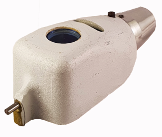 A white object with a hole
Description automatically generated