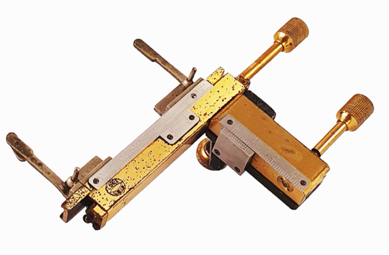 A picture containing table, equipment, sitting, baseball
Description automatically generated