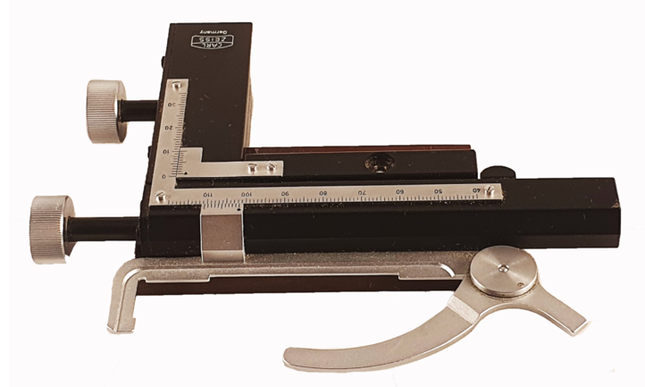 A black and silver measuring device
Description automatically generated